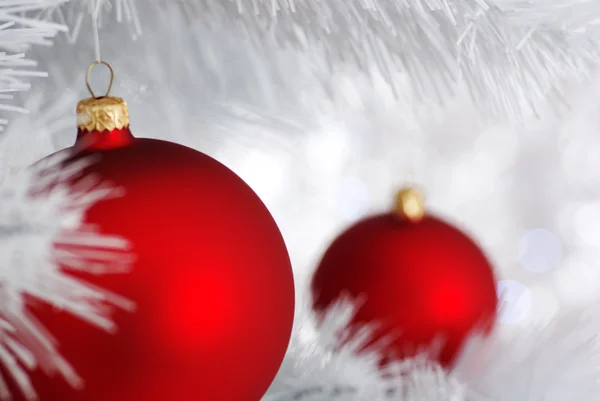 Red balls - Christmas decoration on silver bokeh — Stock Photo, Image