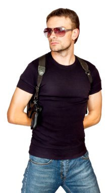 Man with a gun in the holster clipart