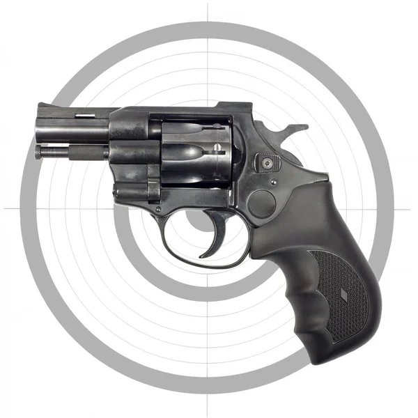 Černý revolver a cíl — Stock fotografie