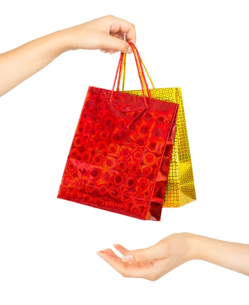 Kadının elleri ile alışveriş torbaları — Stok fotoğraf