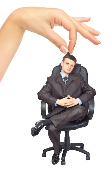 Empresario sentado en silla y mano de mujer —  Fotos de Stock