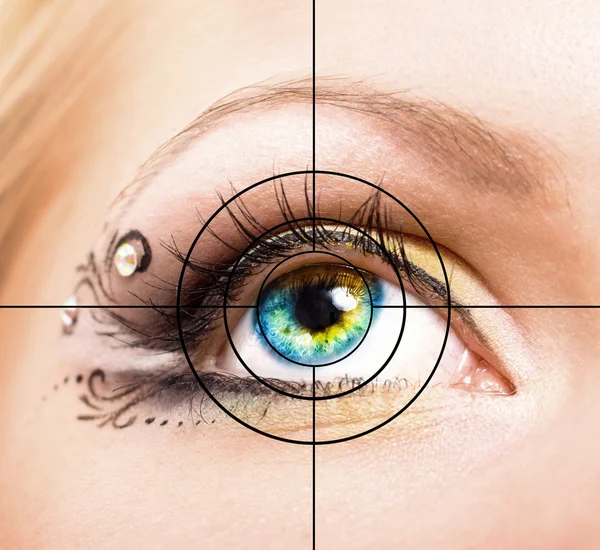 Beautiful eye with makeup and target — Stock Photo, Image