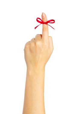 Red bow on finger clipart