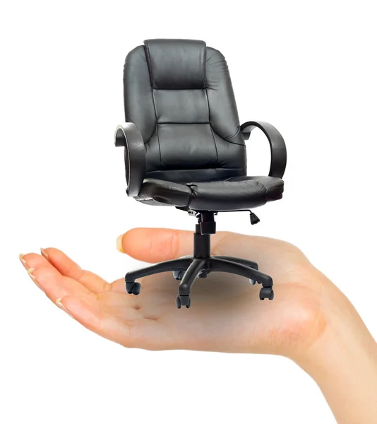 Zwarte stoel in de hand — Stockfoto