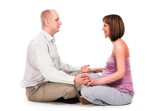 Mąż i żona w ciąży zachować w pozie jogi Obrazek Stockowy