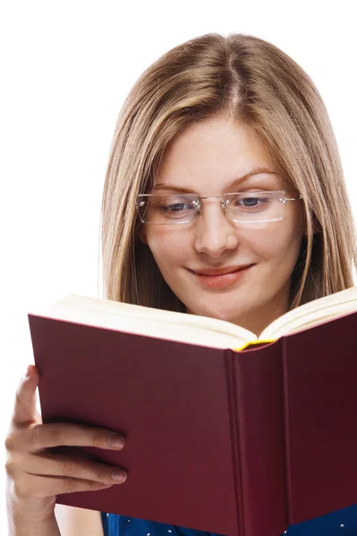 年轻女子眼镜读的书 — 图库照片