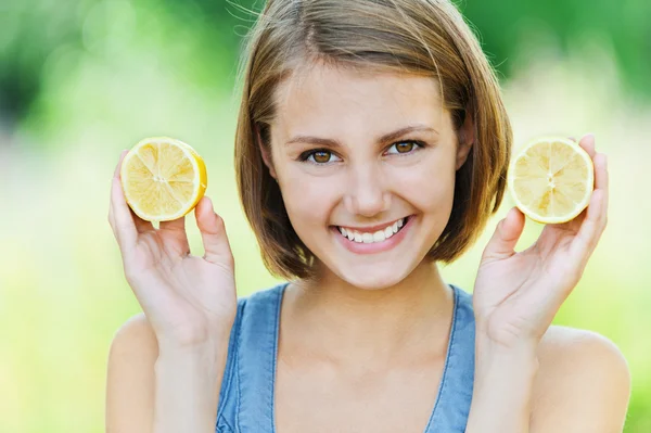 Attractive woman half lemon — Stock Photo, Image