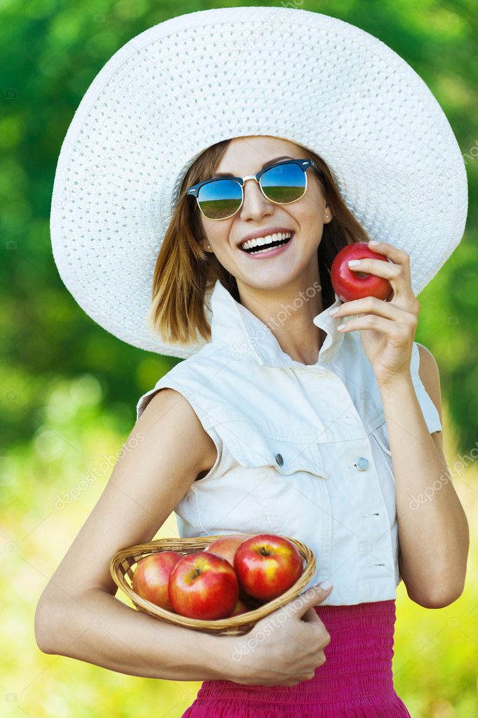 Woman sunglasses hat apples