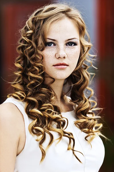 Girl serious curly — Stock Photo, Image