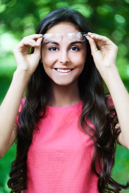 Beautiful woman raised glasses clipart