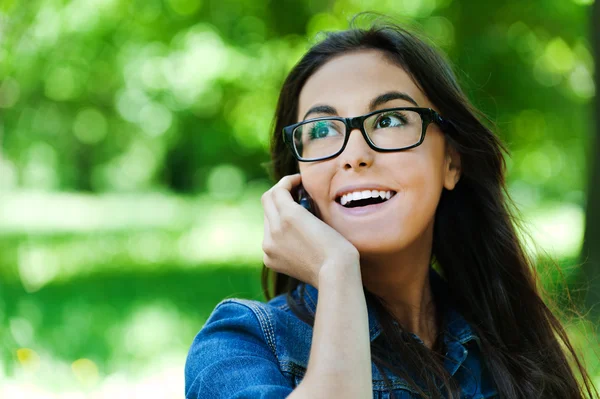 Cute woman glasses talking phone — Stock Photo, Image