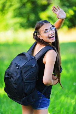 Attractive woman glasses rucksack back clipart