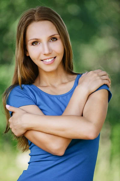 Young beautiful woman smiling crossed arms — Stock Photo, Image