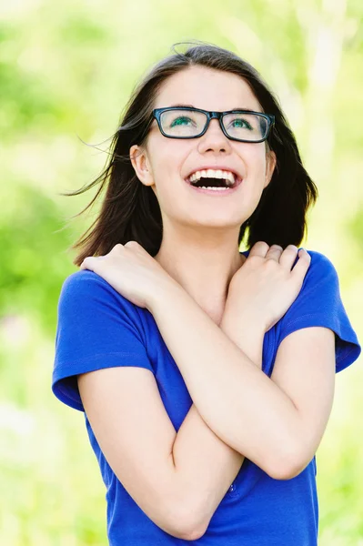 Young girl glasses looking up — Stock Photo, Image