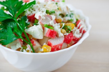 Closeup crab salad with parsley decorated clipart