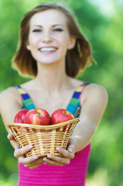Portrait young charming woman basket apples — Stock Photo, Image