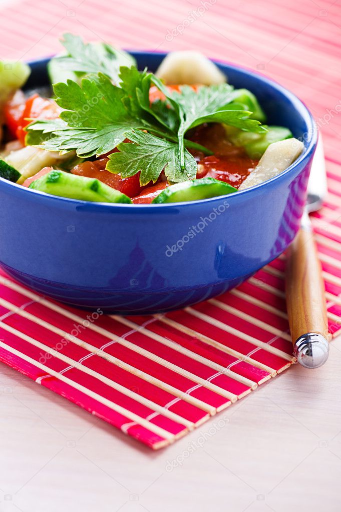 Still life: summer salad on red napkin