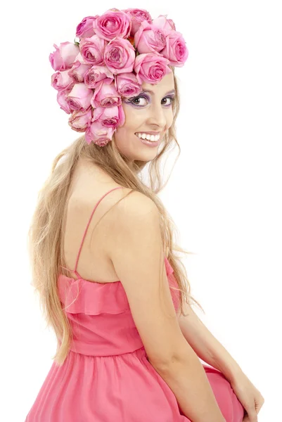 Fiatal gyönyörű nő, rózsaszín virágok — Stock Fotó