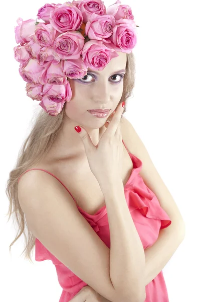 Pembe çiçekli genç güzel kadın — Stok fotoğraf