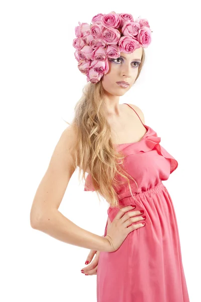 Jovem mulher bonita com flores rosa — Fotografia de Stock
