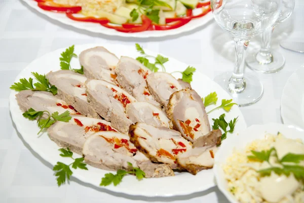 stock image Chicken rolls with bell pepper on porcelain plate