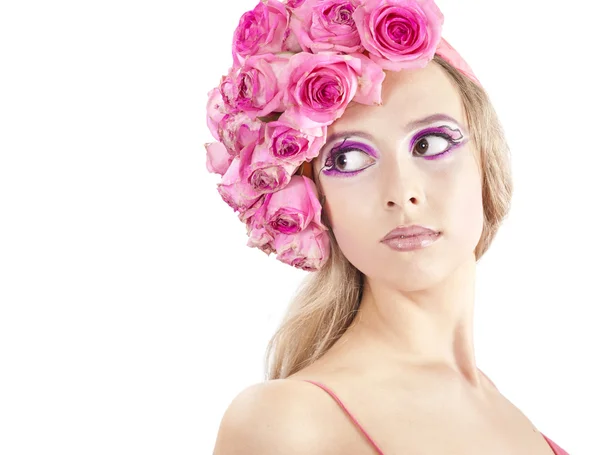 Jovem mulher bonita com flores rosa — Fotografia de Stock
