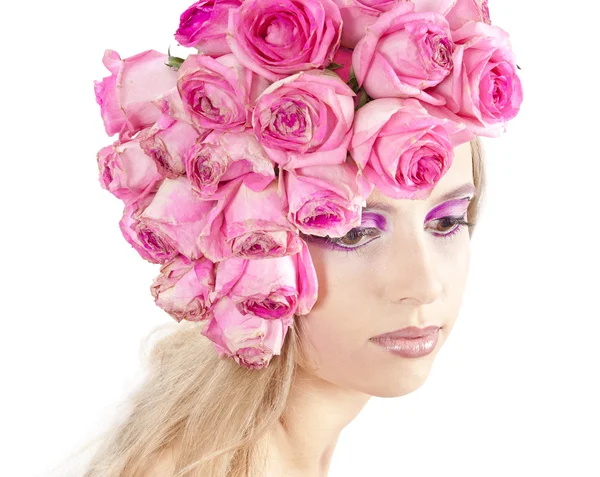 Молода красива жінка з рожевими квітами — стокове фото