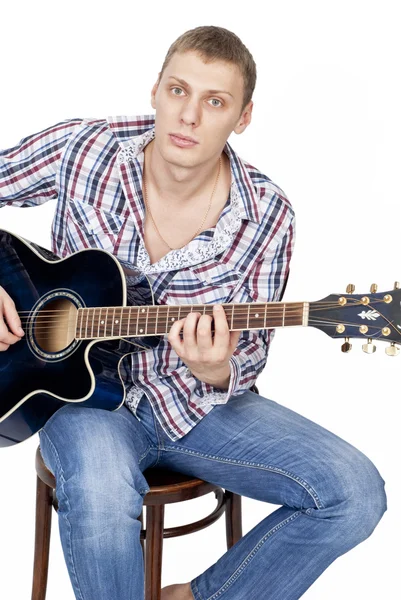 Handsome man with blue guitar — Stock Photo, Image