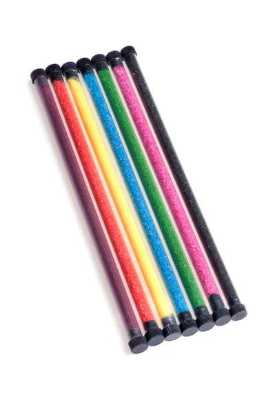 Tubos com areia colorida — Fotografia de Stock