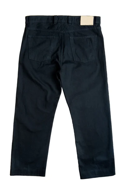 Černé džíny na bílém pozadí — Stock fotografie