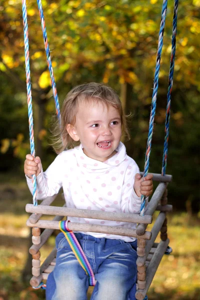 Fun on a swing — Stock Photo, Image