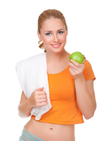 Młoda kobieta z ręcznikiem i jabłko — Zdjęcie stockowe