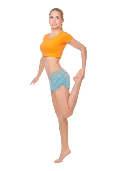 Mladá žena, která dělá gymnastické cvičení — Stock fotografie