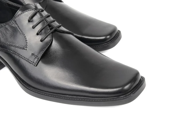 Пара мужских черных ботинок — стоковое фото