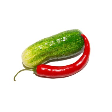 Cucumber and red pepper isolated on white. clipart