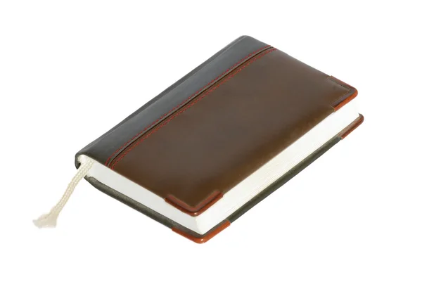 Notebook marrom isolado em branco . — Fotografia de Stock