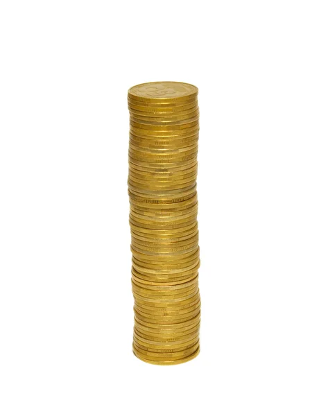 Pile di monete d'oro isolate su bianco . — Foto Stock