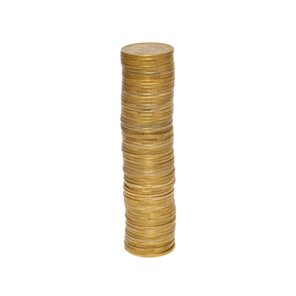 Travar av gyllene mynt isolerad på vit. — Stockfoto