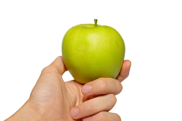 Зеленое вкусное яблоко в руке, изолированное на белом . — стоковое фото