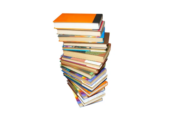 Stapel farbiger Bücher isoliert auf weiß. — Stockfoto