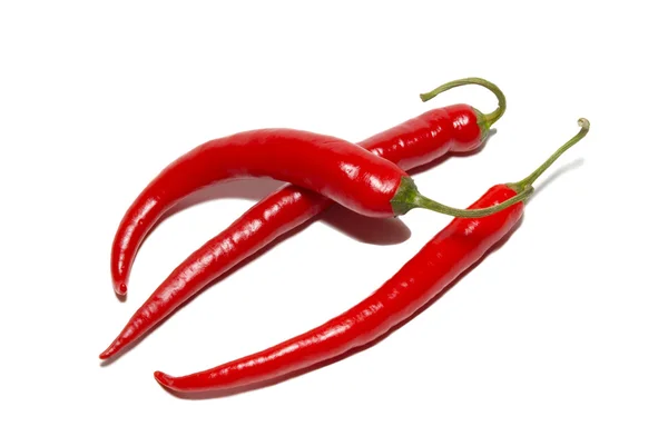 Red hot chilli papričky izolované na bílém. — Stock fotografie