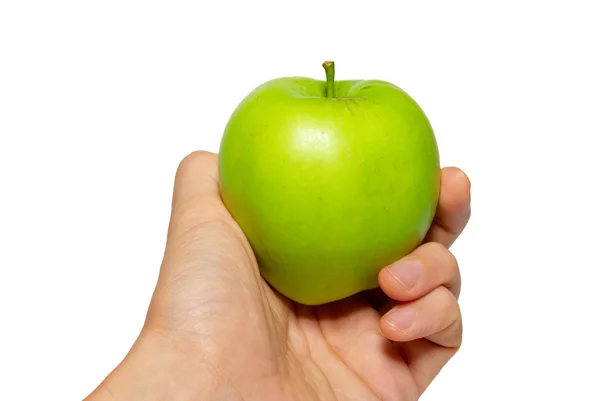 Verde manzana sabrosa en una mano aislada en blanco . — Foto de Stock
