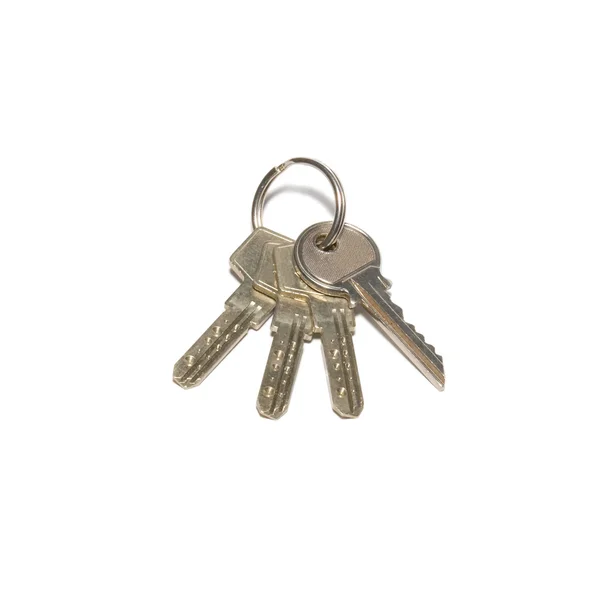 Bunch of silver keys isolated on white. — Stock Photo, Image