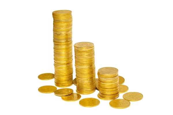 Stacks of golden coins isolated on white. — Stock Photo, Image