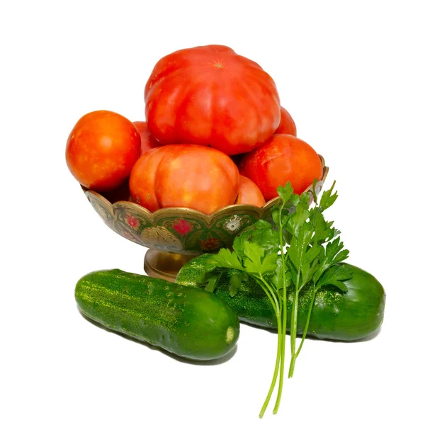 Gemüse im bemalten Teller isoliert auf weiß. — Stockfoto