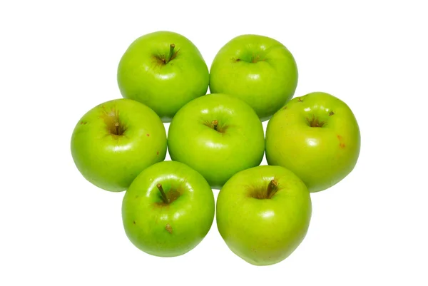 Stos zielone jabłka na białym tle. — Zdjęcie stockowe