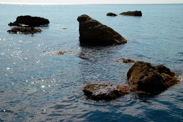 Sea landscape with rocks and water surfañe. — Stok fotoğraf
