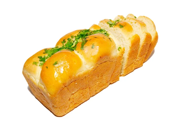 Altın taze ekmek ile üzerine beyaz izole Yeşiller. — Stok fotoğraf