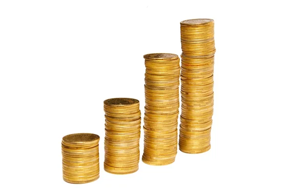 Columnas de monedas de oro aisladas en blanco . — Foto de Stock