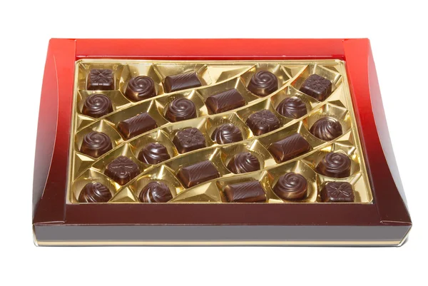 Seřazené čokoládové bonbony box izolované na bílém. — Stock fotografie